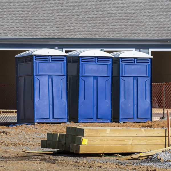 how often are the portable restrooms cleaned and serviced during a rental period in Fortescue